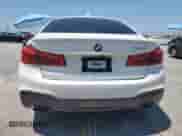 2018 BMW 5 Series 540i with VIN WBAJE5C53JWA93525, listed as a Copart auction lot 65956815 with 73,148 mi miles and Salvage title. Bid and sale history available at DreamBid. Image 6.