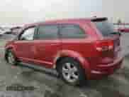 2009 Dodge Journey SXT with VIN 3D4GG57V89T215203, listed as a Copart auction lot 71056615 with 223,065 mi miles and Salvage title. Bid and sale history available at DreamBid. Image 2.
