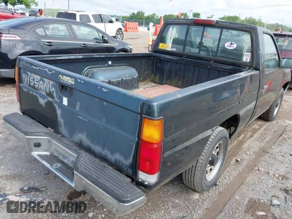1994 Nissan Frontier with VIN 1N6SD11S2RC402971, listed as a IAAI auction lot 42388139 with 122,571 mi miles and . Bid and sale history available at DreamBid. Image 4.