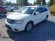 2015 Dodge Journey SXT with VIN 3C4PDCBB3FT692236, listed as a IAAI auction lot 43184383 with Not provided miles and . Bid and sale history available at DreamBid. Image 2.