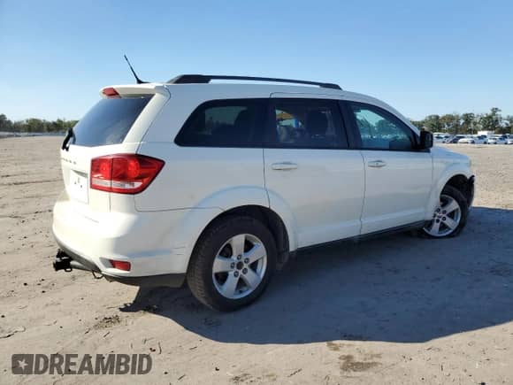 2012 Dodge Journey SXT z VIN 3C4PDDBGXCT134848, wystawiony jako Copart lot #84738805 z przebiegiem 279 245 mil mil oraz Szkoda całkowita • Salvage title. Historia ofert i sprzedaży dostępna na DreamBid. Obrazek 3.