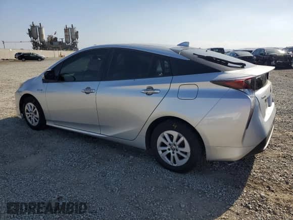 2016 Toyota Prius Two z VIN JTDKBRFUXG3023201, wystawiony jako Copart lot #82238595 z przebiegiem 253 588 mil mil oraz Szkoda całkowita • Salvage title. Historia ofert i sprzedaży dostępna na DreamBid. Obrazek 2.