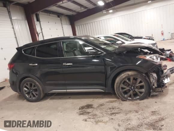 2018 Hyundai Santa Fe Ultimate с VIN 5XYZWDLA6JG518207, выставлен на аукционе IAAI как лот 41690166 с пробегом 101 603 миль миль и . История ставок и продаж доступна на DreamBid. Изображение 13.