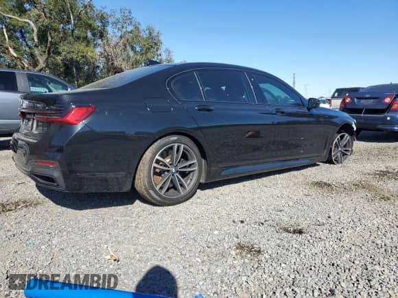 2022 BMW 7 Series 750i xDrive with VIN WBA7U2C05NCH77127, listed as a Copart auction lot 83849074 with 35,079 mi miles and Salvage title. Bid and sale history available at DreamBid. Image 3.