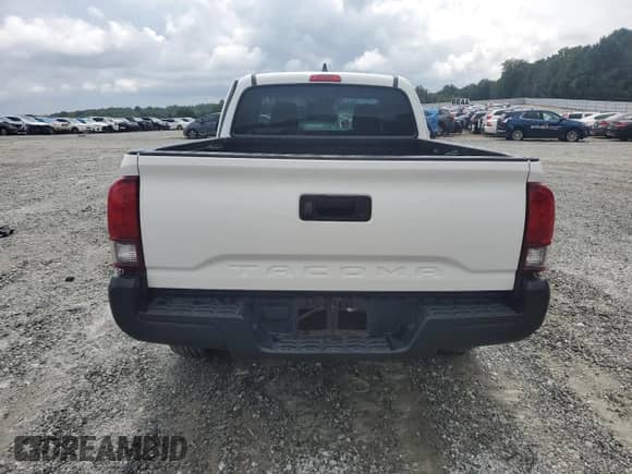 2023 Toyota Tacoma SR z VIN 3TYRX5GN2PT085100, wystawiony jako Copart lot #70010035 z przebiegiem 48 446 mil mil oraz Szkoda całkowita • Salvage title. Historia ofert i sprzedaży dostępna na DreamBid. Obrazek 6.