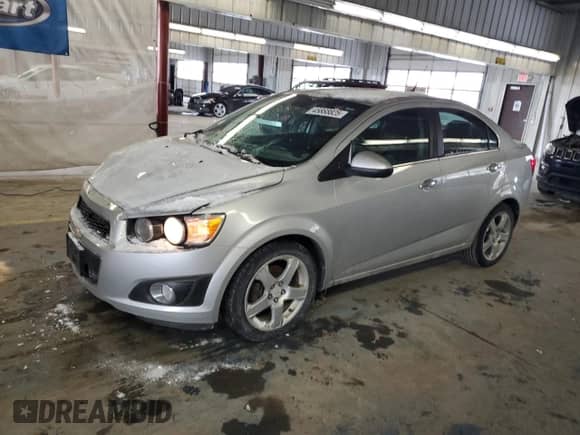 2013 Chevrolet Sonic LTZ z VIN 1G1JE5SH3D4123997, wystawiony jako Copart lot #45868825 z przebiegiem 120 913 mil mil oraz Szkoda całkowita • Salvage title. Historia ofert i sprzedaży dostępna na DreamBid. Obrazek 1.