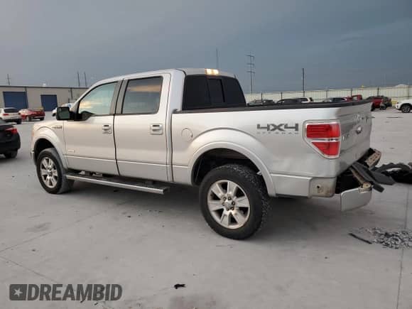 2012 Ford F-150 Lariat with VIN 1FTFW1ET0CFB34252, listed as a Copart auction lot 82726885 with 210,606 mi miles and Salvage title. Bid and sale history available at DreamBid. Image 2.