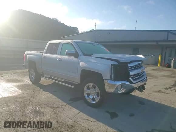 2018 Chevrolet Silverado 1500 LTZ с VIN 3GCUKSECXJG601665, выставлен на аукционе Copart как лот 70763825 с пробегом 41 751 миль миль и Списание • Salvage title. История ставок и продаж доступна на DreamBid. Изображение 13.