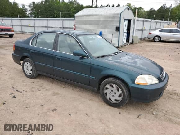 1997 Honda Civic z VIN JHMEJ8544VS002051, wystawiony jako Copart lot #58399195 z przebiegiem 239 283 mil mil oraz Szkoda całkowita • Salvage title. Historia ofert i sprzedaży dostępna na DreamBid. Obrazek 4.