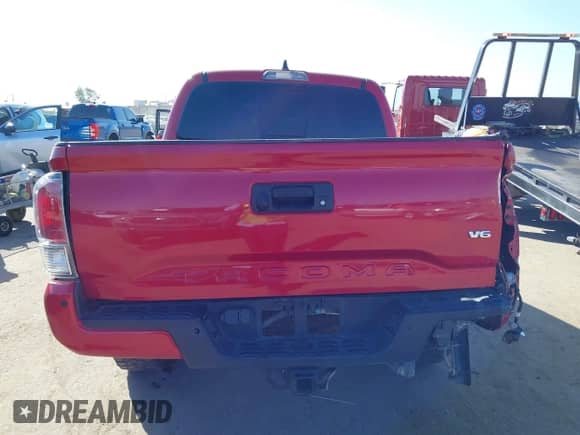 2021 Toyota Tacoma SR z VIN 5TFCZ5AN0MX262902, wystawiony jako IAAI lot #43535009 z przebiegiem 70 926 mil mil oraz . Historia ofert i sprzedaży dostępna na DreamBid. Obrazek 15.