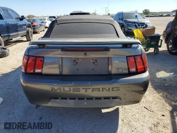 2004 Ford Mustang Deluxe с VIN 1FAFP44404F117628, выставлен на аукционе Copart как лот 81377524 с пробегом 39 697 миль миль и Списание • Salvage title. История ставок и продаж доступна на DreamBid. Изображение 6.