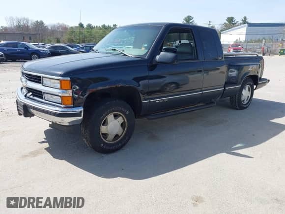 1997 Chevrolet Silverado 1500 with VIN 2GCEK19R3V1159386, listed as a IAAI auction lot 42159684 with 98,577 mi miles and . Bid and sale history available at DreamBid. Image 2.