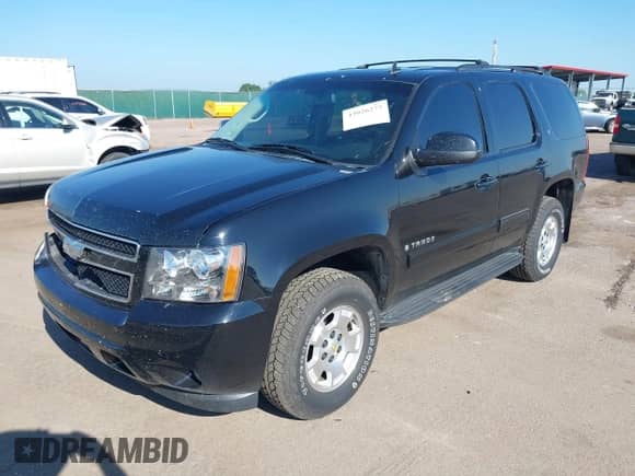 2009 Chevrolet Tahoe 2LT with VIN 1GNFK23079R260424, listed as a IAAI auction lot 43026277 with 253,109 mi miles and . Bid and sale history available at DreamBid. Image 2.