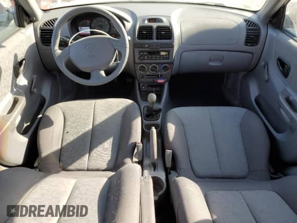 2004 Hyundai Accent GL z VIN KMHCG45C54U502872, wystawiony jako Copart lot #81716375 z przebiegiem 73 421 mil mil oraz Szkoda całkowita • Salvage title. Historia ofert i sprzedaży dostępna na DreamBid. Obrazek 8.