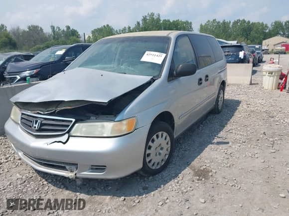 2004 Honda Odyssey LX with VIN 5FNRL18574B063642, listed as a IAAI auction lot 42911425 with 270,749 mi miles and . Bid and sale history available at DreamBid. Image 2.