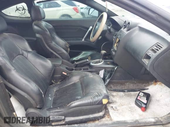 2003 Hyundai Tiburon GT с VIN KMHHN65F63U072432, выставлен на аукционе IAAI как лот 42813911 с пробегом 162 894 миль миль и . История ставок и продаж доступна на DreamBid. Изображение 5.