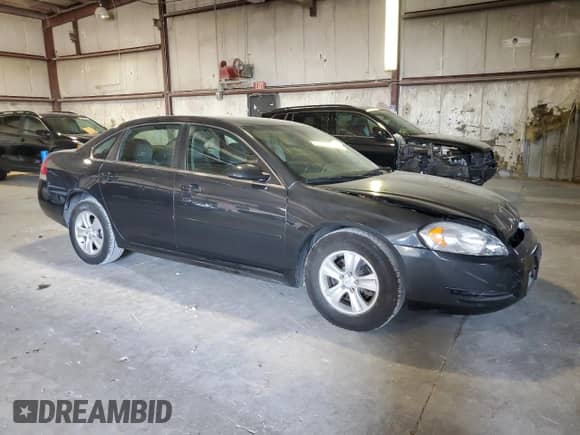 2013 Chevrolet Impala LS with VIN 2G1WF5E35D1116189, listed as a Copart auction lot 71920805 with 83,561 mi miles and Salvage title. Bid and sale history available at DreamBid. Image 4.