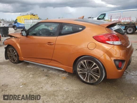 2016 Hyundai Veloster Turbo с VIN KMHTC6AE5GU300553, выставлен на аукционе Copart как лот 71202625 с пробегом 84 144 миль миль и Списание • Salvage title. История ставок и продаж доступна на DreamBid. Изображение 2.