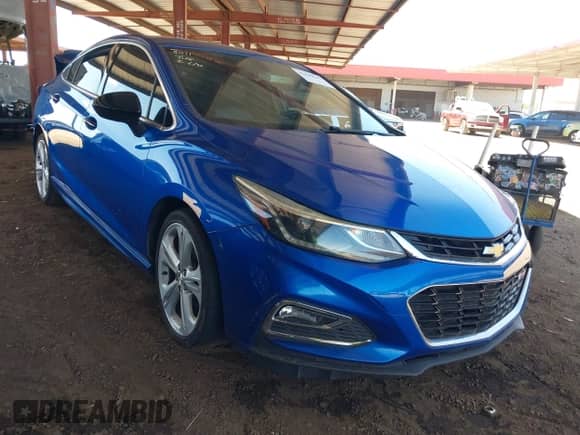 2016 Chevrolet Cruze Premier z VIN 1G1BG5SM0G7324934, wystawiony jako IAAI lot #42690646 z przebiegiem 111 716 mil mil oraz . Historia ofert i sprzedaży dostępna na DreamBid. Obrazek 1.