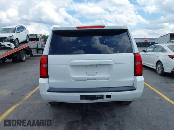 2015 Chevrolet Tahoe Commercial with VIN 1GNLC2EC1FR721538, listed as a IAAI auction lot 42274601 with 138,991 mi miles and . Bid and sale history available at DreamBid. Image 16.