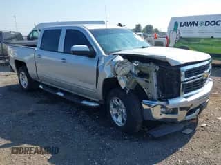 2015 Chevrolet Silverado 1500 LT z VIN 3GCUKREC5FG112526, wystawiony jako IAAI lot #42577282 z przebiegiem 98 001 mil mil oraz . Historia ofert i sprzedaży dostępna na DreamBid. Obrazek 1.