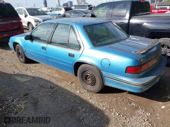 1992 Chevrolet Lumina z VIN 2G1WL54T7N9133525, wystawiony jako IAAI lot #42292518 z przebiegiem 102 736 mil mil oraz . Historia ofert i sprzedaży dostępna na DreamBid. Obrazek 3.