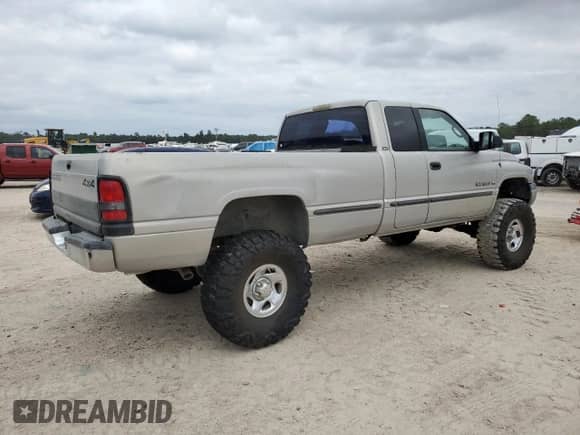 1999 Dodge 1500 с VIN 3B7HF13Y1XG176120, выставлен на аукционе Copart как лот 79010854 с пробегом 154 800 миль миль и Списание • Salvage title. История ставок и продаж доступна на DreamBid. Изображение 3.
