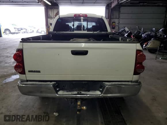 2007 Dodge 1500 SLT z VIN 3D7KR19D07G833903, wystawiony jako Copart lot #87939265 z przebiegiem 229 748 mil mil oraz Szkoda całkowita • Salvage title. Historia ofert i sprzedaży dostępna na DreamBid. Obrazek 6.