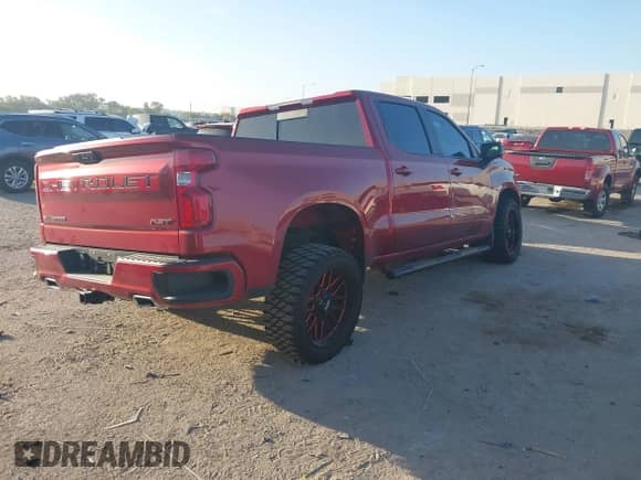 2023 Chevrolet Silverado 1500 RST with VIN 1GCUDEED6PZ293519, listed as a IAAI auction lot 42866663 with 21,617 mi miles and . Bid and sale history available at DreamBid. Image 4.