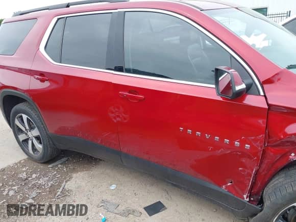 2021 Chevrolet Traverse LT с VIN 1GNERHKW4MJ132343, выставлен на аукционе IAAI как лот 42393706 с пробегом 99 159 миль миль и . История ставок и продаж доступна на DreamBid. Изображение 13.