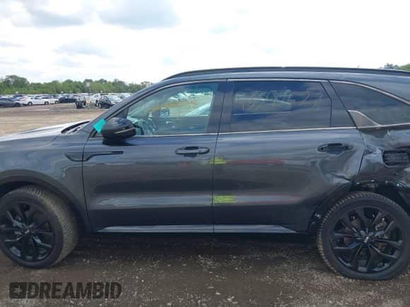 2021 Kia Sorento SX Prestige X-Line with VIN 5XYRKDLF2MG041934, listed as a IAAI auction lot 43290527 with 63,769 mi miles and . Bid and sale history available at DreamBid. Image 14.