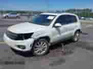 2015 Volkswagen Tiguan S with VIN WVGAV7AX4FW506314, listed as a IAAI auction lot 42063584 with 143,939 mi miles and . Bid and sale history available at DreamBid. Image 2.