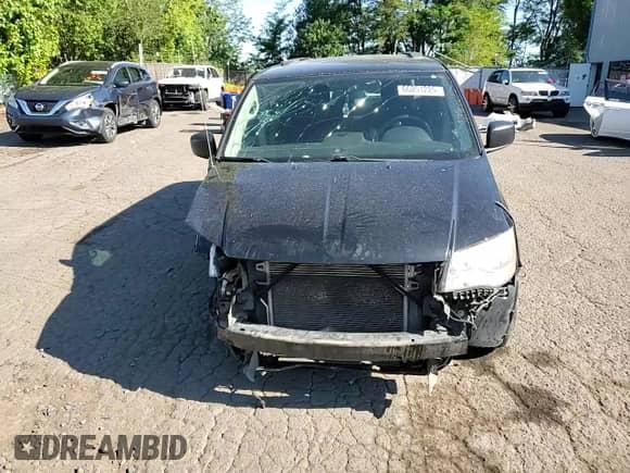 2011 Dodge Grand Caravan Express with VIN 2D4RN4DG2BR683189, listed as a Copart auction lot 66051225 with 144,483 mi miles and Salvage title. Bid and sale history available at DreamBid. Image 14.