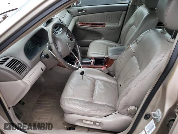 2002 Toyota Camry XLE with VIN 4T1BF30K02U513315, listed as a Copart auction lot 69803955 with 222,371 mi miles and Salvage title. Bid and sale history available at DreamBid. Image 7.