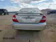 2004 Toyota Camry LE with VIN JTDBE32K740271038, listed as a Copart auction lot 82108005 with 220,896 mi miles and Salvage title. Bid and sale history available at DreamBid. Image 6.