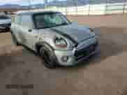 2015 MINI Hardtop with VIN WMWXM5C50FT937233, listed as a Copart auction lot 50077295 with 87,785 mi miles and Salvage title. Bid and sale history available at DreamBid. Image 10.