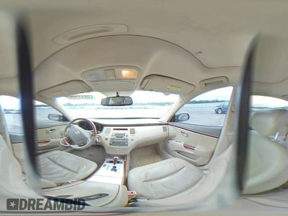 2007 Hyundai Azera SE с VIN KMHFC46F67A175275, выставлен на аукционе Copart как лот 69844395 с пробегом 238 601 миль миль и Списание • Salvage title. История ставок и продаж доступна на DreamBid. Изображение 14.