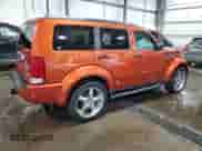 2007 Dodge Nitro SLT с VIN 1D8GU58K17W565534, выставлен на аукционе Copart как лот 61481614 с пробегом 65 690 миль миль и Списание • Salvage title. История ставок и продаж доступна на DreamBid. Изображение 3.