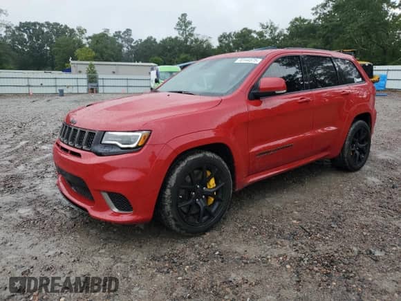 2021 Jeep Grand Cherokee Trackhawk z VIN 1C4RJFN94MC756921, wystawiony jako Copart lot #70144575 z przebiegiem 43 736 mil mil oraz Szkoda całkowita • Salvage title. Historia ofert i sprzedaży dostępna na DreamBid. Obrazek 1.