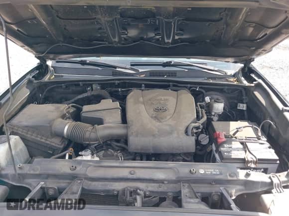 2018 Toyota Tacoma SR5 z VIN 5TFSZ5AN2JX151257, wystawiony jako IAAI lot #42895721 z przebiegiem 157 990 mil mil oraz . Historia ofert i sprzedaży dostępna na DreamBid. Obrazek 10.