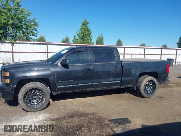 2014 Chevrolet Silverado 1500 LTZ with VIN 1GCUKSEC3EF196319, listed as a IAAI auction lot 42377259 with 158,755 mi miles and . Bid and sale history available at DreamBid. Image 14.