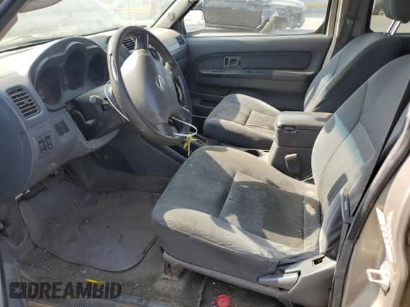 2002 Nissan Frontier SE with VIN 1N6ED29X22C344627, listed as a Copart auction lot 62096615 with 356,468 mi miles and Salvage title. Bid and sale history available at DreamBid. Image 7.