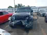 2020 Jeep Wrangler Sport S with VIN 1C4GJXAG9LW303604, listed as a IAAI auction lot 42221305 with 71,189 mi miles and . Bid and sale history available at DreamBid. Image 12.