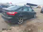 2014 Ford Focus Titanium with VIN 1FADP3J22EL460562, listed as a IAAI auction lot 43097385 with 112,756 mi miles and . Bid and sale history available at DreamBid. Image 4.