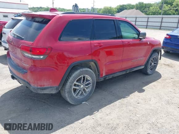 2017 Jeep Grand Cherokee Trailhawk z VIN 1C4RJFLT8HC693715, wystawiony jako IAAI lot #42531133 z przebiegiem 128 250 mil mil oraz . Historia ofert i sprzedaży dostępna na DreamBid. Obrazek 4.