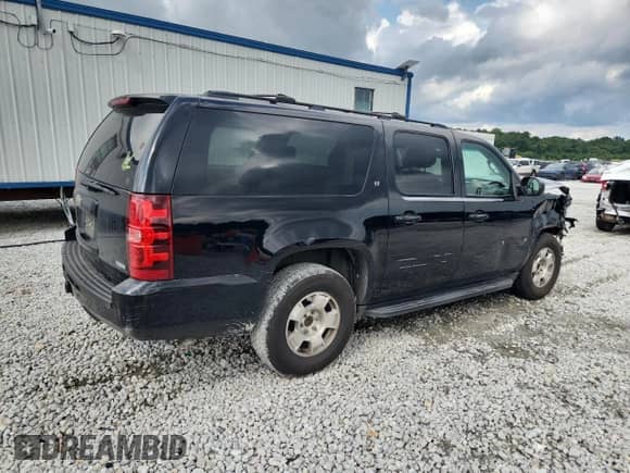 2009 Chevrolet Suburban 2LT with VIN 1GNFC26089R188805, listed as a Copart auction lot 70136265 with 180,613 mi miles and Salvage title. Bid and sale history available at DreamBid. Image 3.