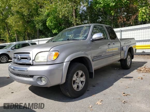 2004 Toyota Tundra SR5 z VIN 5TBBT44184S439680, wystawiony jako Copart lot #69971965 z przebiegiem 219 367 mil mil oraz Czysty tytuł • Clean title. Historia ofert i sprzedaży dostępna na DreamBid. Obrazek 1.