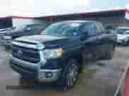 2014 Toyota Tundra SR with VIN 5TFRM5F11EX080643, listed as a IAAI auction lot 43296399 with 247,504 mi miles and . Bid and sale history available at DreamBid. Image 17.