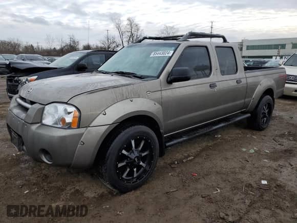2004 Nissan Frontier XE z VIN 1N6ED29Y54C462070, wystawiony jako Copart lot #85443024 z przebiegiem Nie podano mil oraz Szkoda całkowita • Salvage title. Historia ofert i sprzedaży dostępna na DreamBid. Obrazek 1.