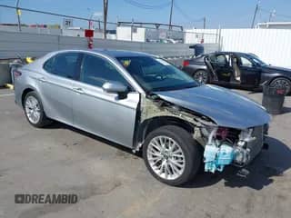 2020 Toyota Camry Hybrid XLE with VIN 4T1F31AK3LU523125, listed as a IAAI auction lot 43513985 with 90,862 mi miles and . Bid and sale history available at DreamBid. Image 1.